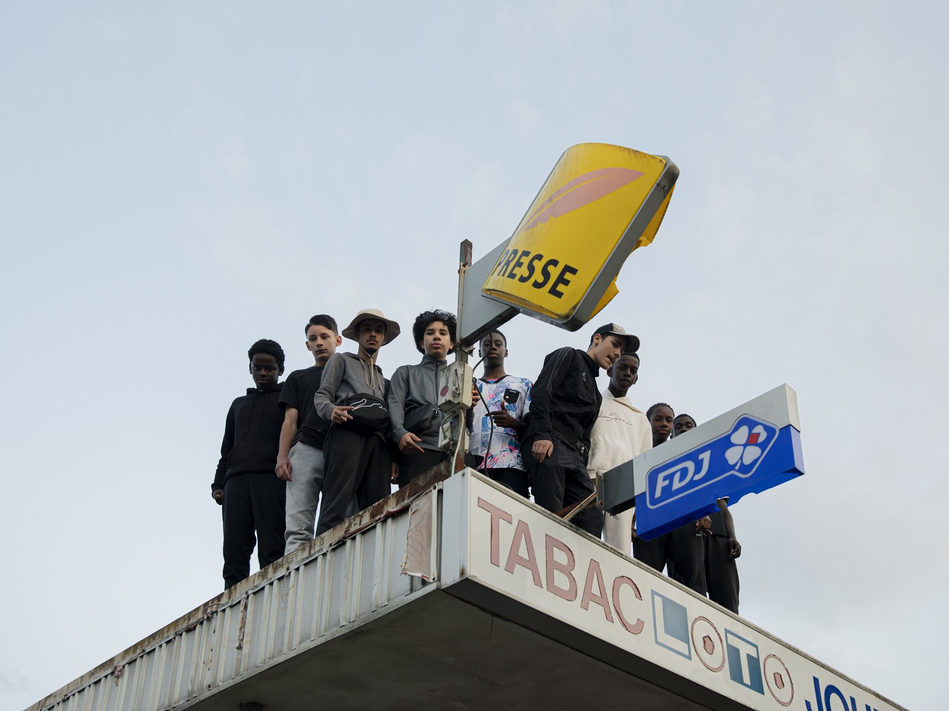 <p>Young men gather on a rooftop in the Briques Rouges, one of the largest social housing projects in Verneuil-sur-Seine, France.</p>
<br />
&nbsp;